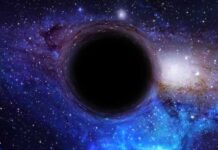 Black Hole Image Shocks Science World A black hole surrounded by a colorful galaxy filled with stars