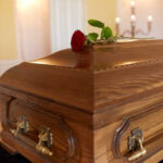 VIDEO: Outrage as Veteran Dies in Assisted Living Freezer A wooden casket with a red rose placed on top
