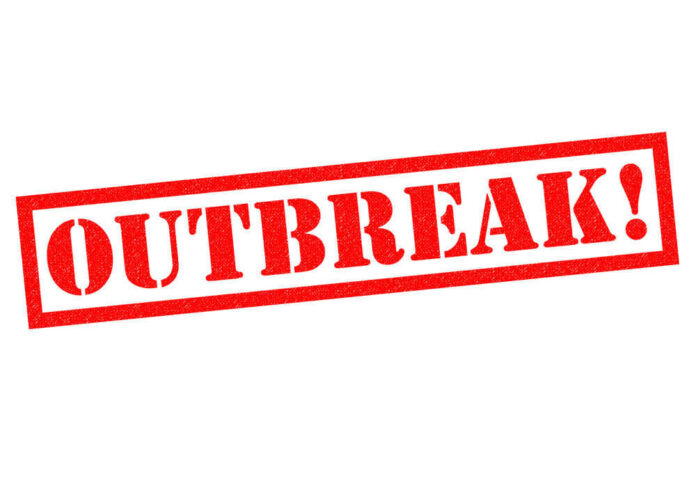 Red text indicating outbreak alert message