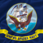 Trump’s Navy Shake-Up United States Navy flag with eagle and ship.