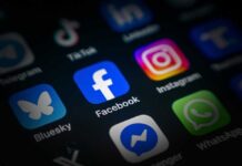 Allies SHOCKED: America Demands Social Media Surrender Close-up of various social media application icons on a smartphone screen