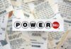 A collection of Powerball lottery tickets with the Powerball logo in the foreground