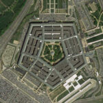 Pentagon Purge Backfires — Fired Admiral Strikes Back Aerial view of the Pentagon building surrounded by roads and parking lots