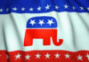 Republican Party elephant logo on American flag background.