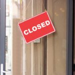 Fast Food Chain Nightmare: 350 Stores Closing A red 'CLOSED' sign hanging on a storefront door
