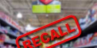 Blurred store aisle with RECALL stamp overlay.