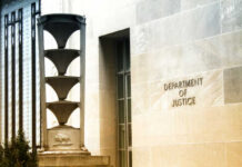 Exterior view of the Department of Justice building with architectural features