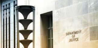 Exterior view of the Department of Justice building with architectural features
