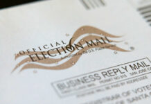 Official election mail envelope with postal service markings