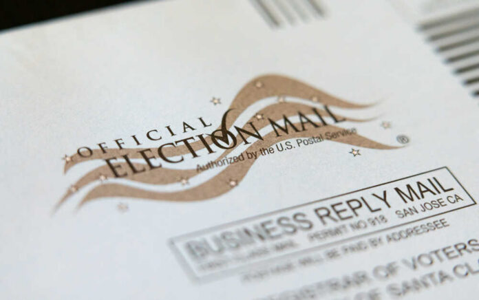 shutterstock_1832059180.jpg Official election mail envelope with postal service markings