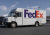 FedEx delivery truck parked in a lot