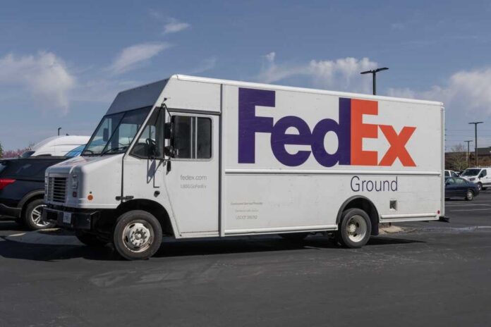 FedEx delivery truck parked in a lot