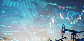 Oil pumps and financial charts against world map