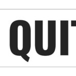 A bold text sign that reads 'I QUIT'