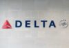 Delta Airlines logo displayed on a wall