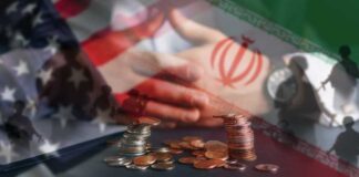 A hand resting on a table with coins stacked in front, overlaid with flags of the US and Iran