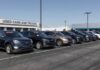 New Truck Alliance Targets Hard-Working Americans Row of used cars for sale at a dealership with price tags displayed