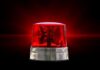 Red emergency light on a black background
