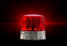 Red emergency light on a black background