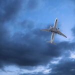 SHOCKING 1996 Plane Massacre Resurfaces An airplane flying through a cloudy sky