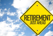 Retirees Get Rare Good News A yellow road sign indicating retirement is just ahead