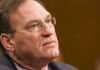 Alito vs. Jackson — BRUTAL Exchange at the Supreme Court Close-up of a man wearing glasses, looking thoughtful.