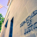 Hate Crime Plot? DOJ Drops Bombshell Department of Justice building with American flag.