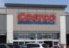 Price Drop: Costco’s Hidden Win Exterior view of a Costco Wholesale store with a clear blue sky