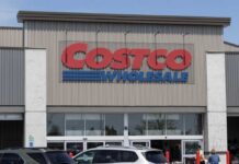 Price Drop: Costco’s Hidden Win Exterior view of a Costco Wholesale store with a clear blue sky
