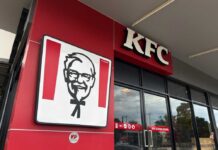 KFC’s Radical Reboot: What’s Really Changing? KFC restaurant sign against a blue sky