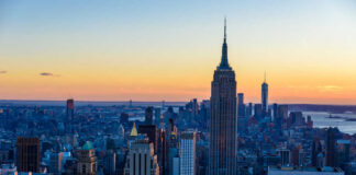Empire State Building at sunset over Manhattan skyline