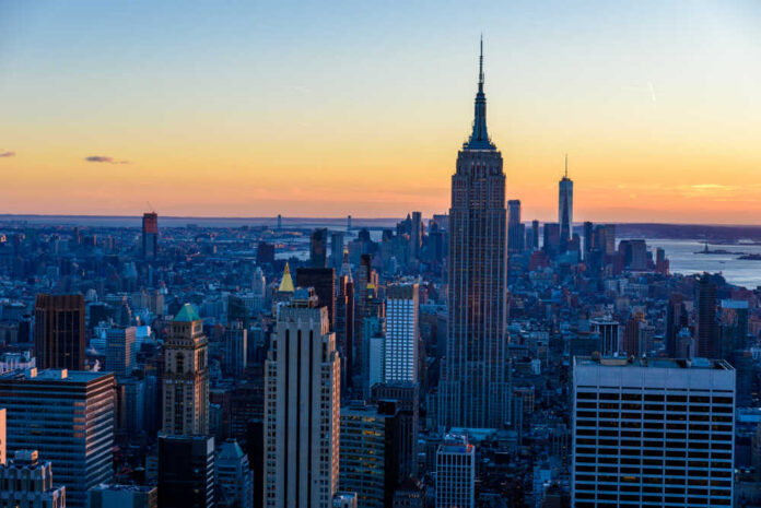 Empire State Building at sunset over Manhattan skyline